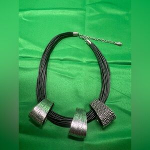 Black statement multi strand necklace with silver metal chunks